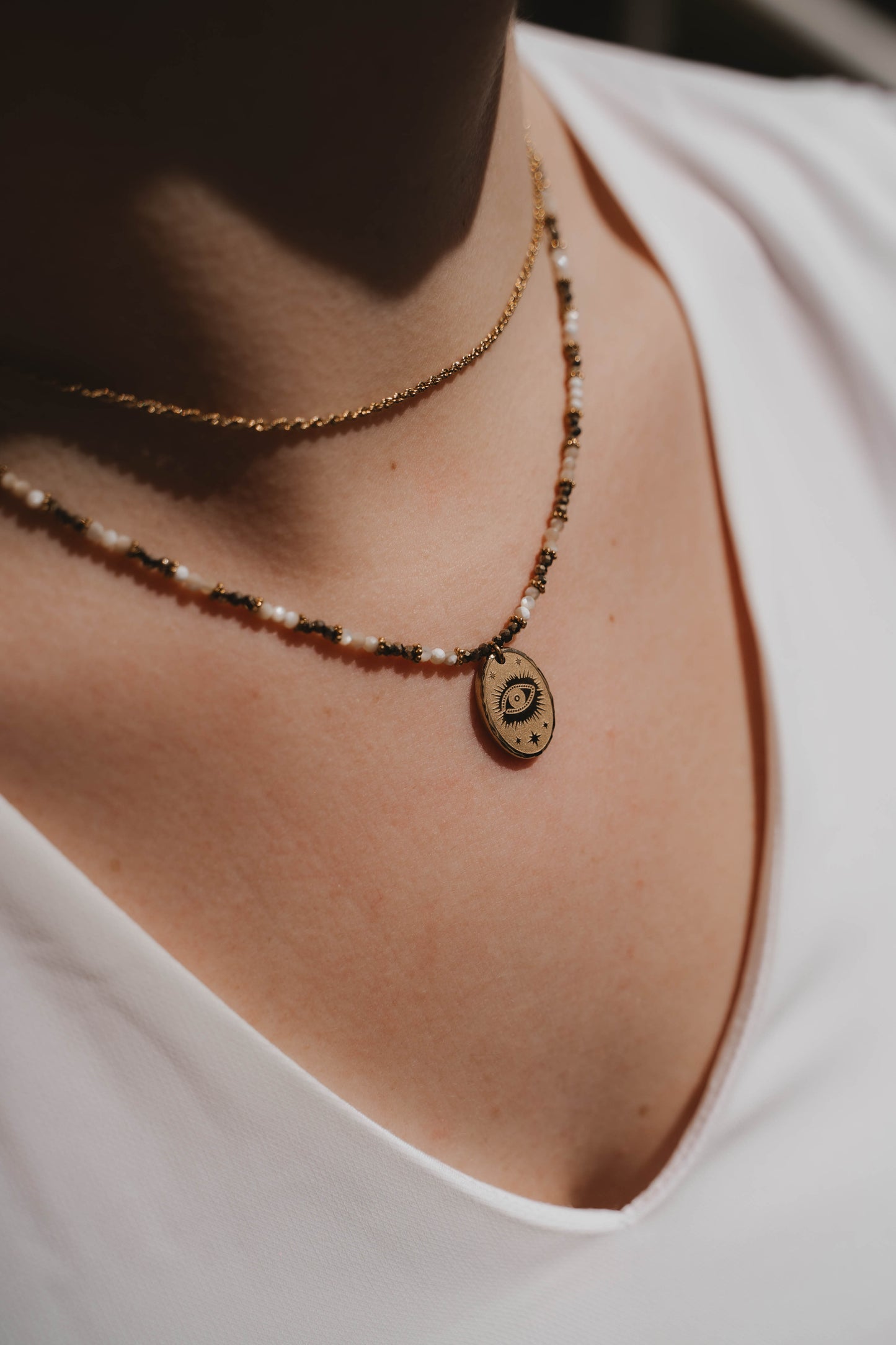 Salem | Collier en acier inoxydable et pierres naturelles | Nacre et Pyrite | Doré