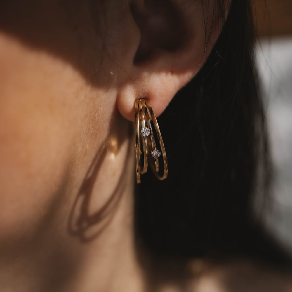 
                      
                        Lausanne | Boucles d'oreilles / créoles en acier inoxydable | Doré
                      
                    