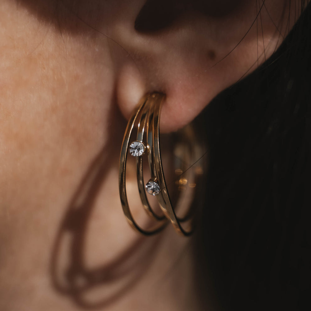 
                      
                        Lausanne | Boucles d'oreilles / créoles en acier inoxydable | Doré
                      
                    