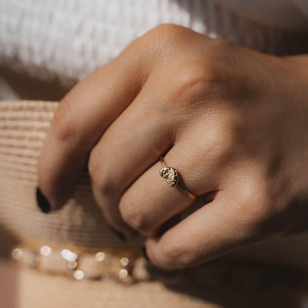 
                      
                        Fira | Bague en acier inoxydable | Doré
                      
                    
