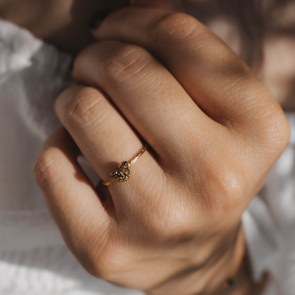 
                      
                        Fira | Bague en acier inoxydable | Doré
                      
                    