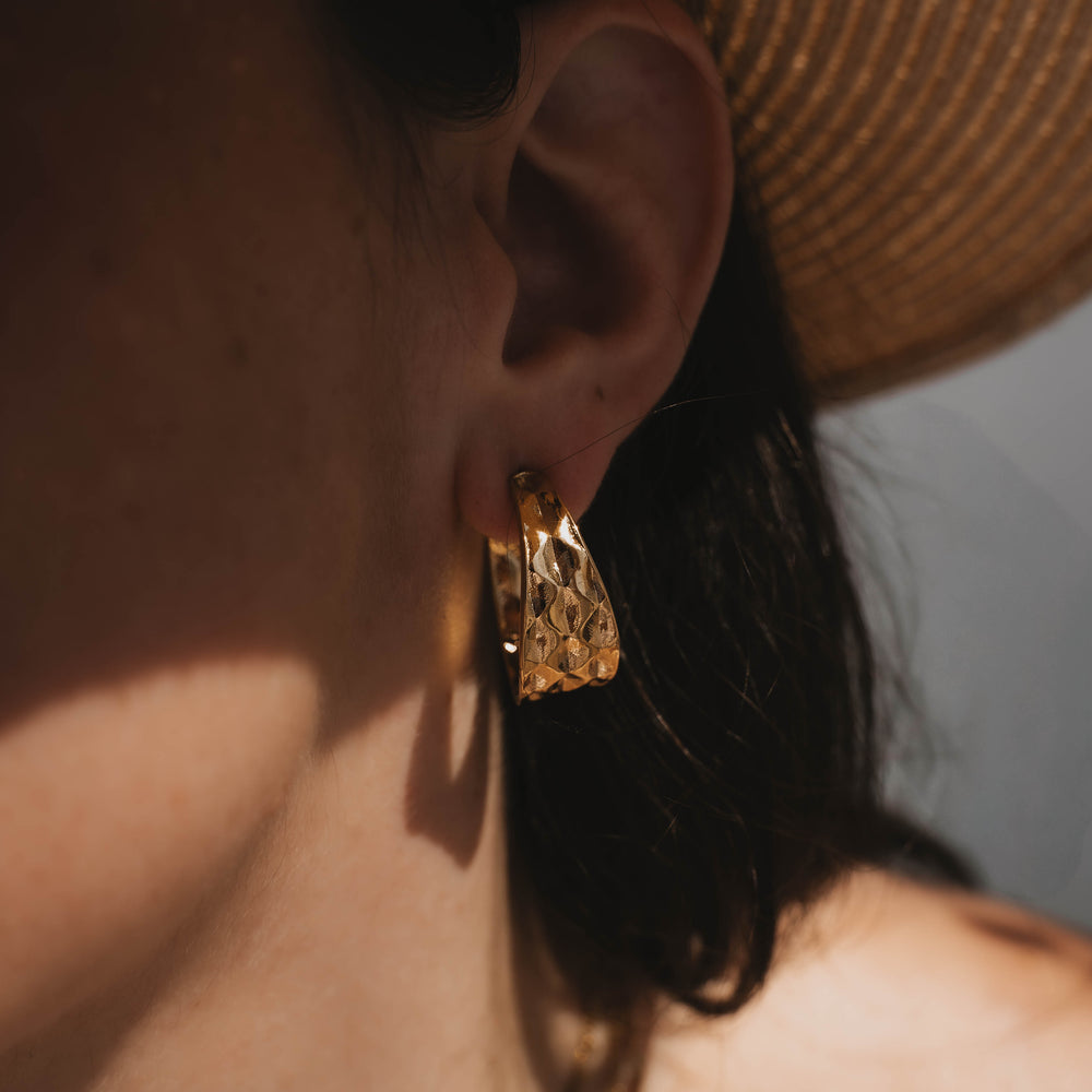 
                      
                        Caracas | Boucles d'oreilles / créoles en acier inoxydable | Doré
                      
                    