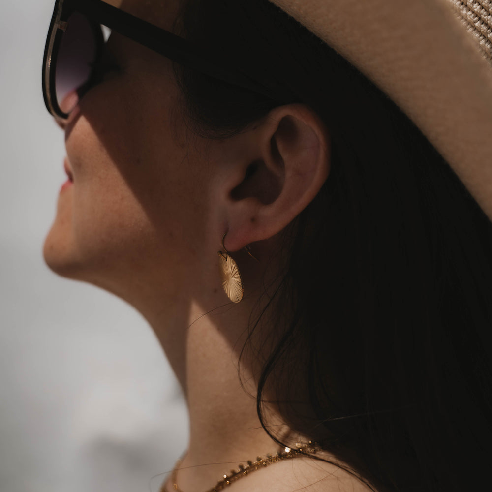 
                      
                        Formentera | Boucles d'oreilles en acier inoxydable | Doré
                      
                    