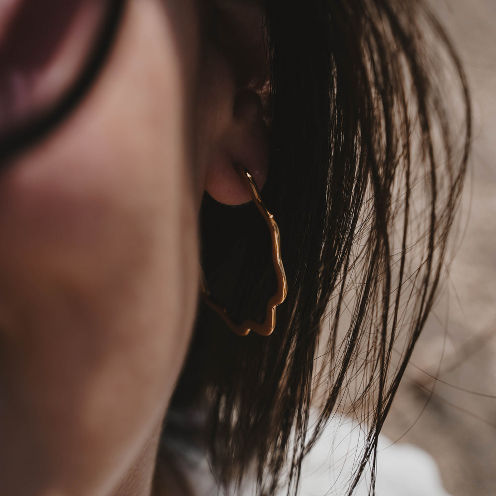 
                      
                        Cassis | Boucles d'oreilles / Créoles en acier inoxydable | Doré
                      
                    