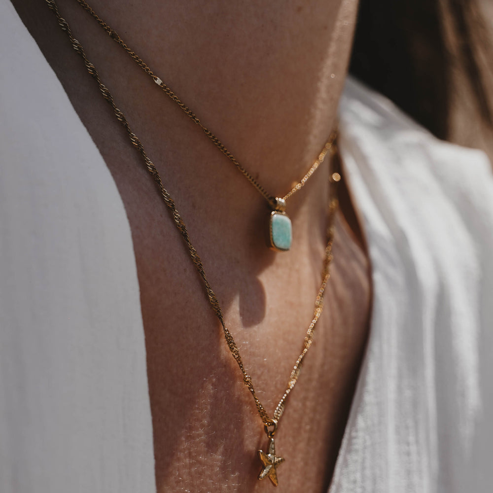 
                      
                        Le Veillon | Collier en acier inoxydable | Doré
                      
                    
