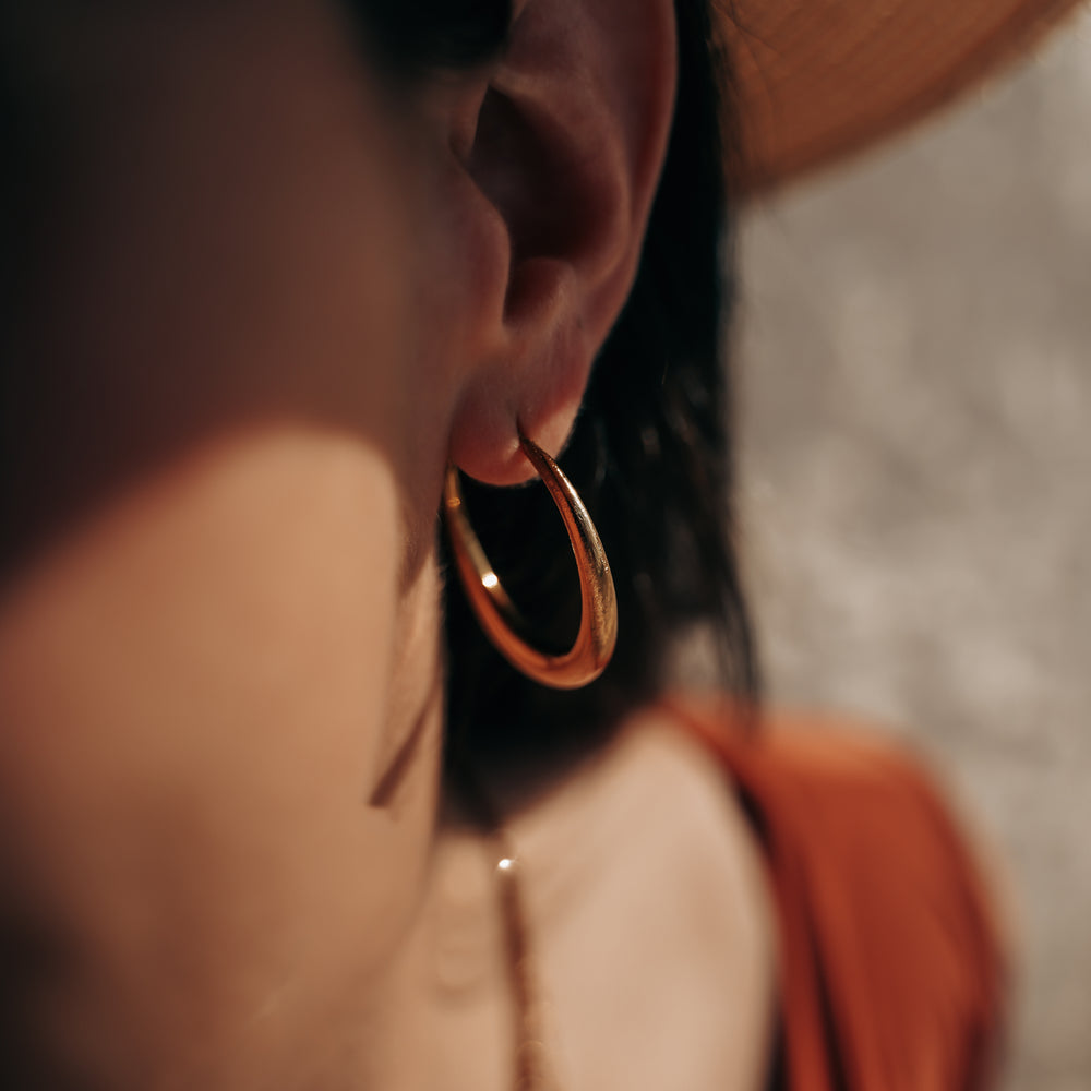 
                      
                        Rosario | Boucles d'oreilles / créoles en acier inoxydable | 3,5cm | Doré
                      
                    