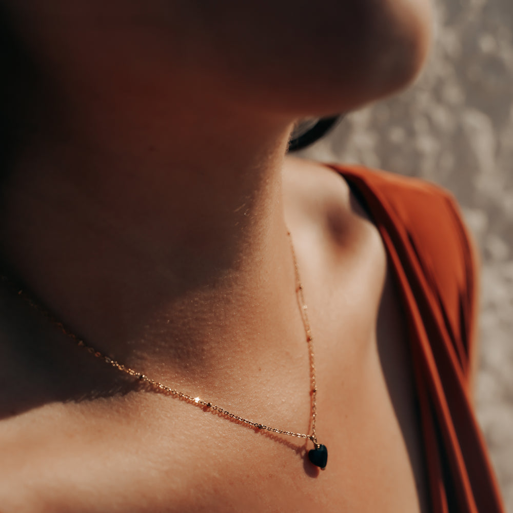 
                      
                        Bologne | Collier en acier inxydable et pierre naturelle | Onyx | Doré
                      
                    