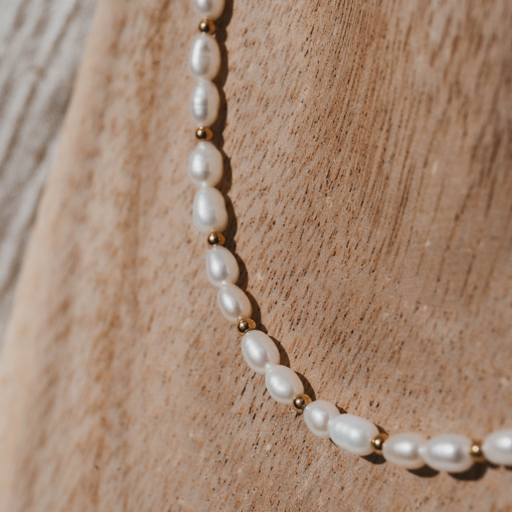 
                      
                        Milwaukee | Collier en acier inoxydable et pierres naturelles | Perles de culture | Doré
                      
                    