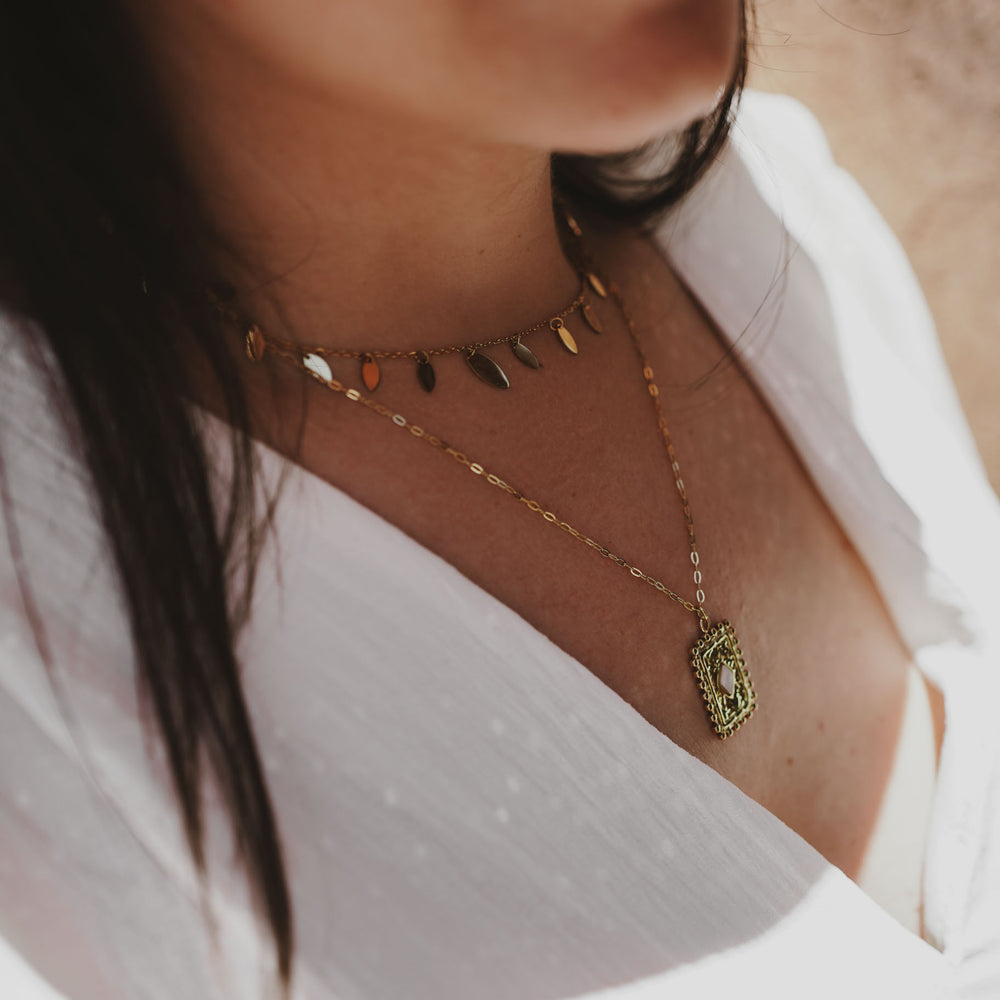 
                      
                        Collier acier inoxydable et pierre naturelle Nacre - Akumal - Doré
                      
                    