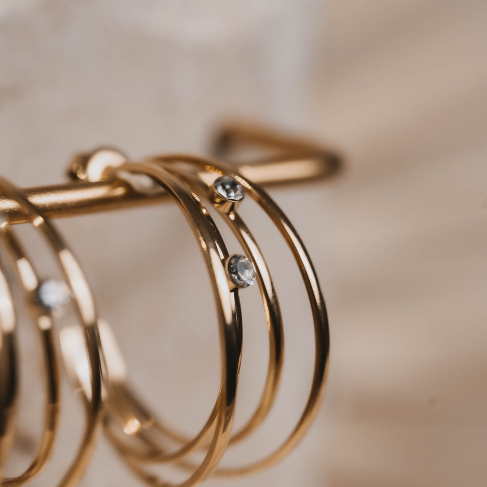 
                      
                        Lausanne | Boucles d'oreilles / créoles en acier inoxydable | Doré
                      
                    