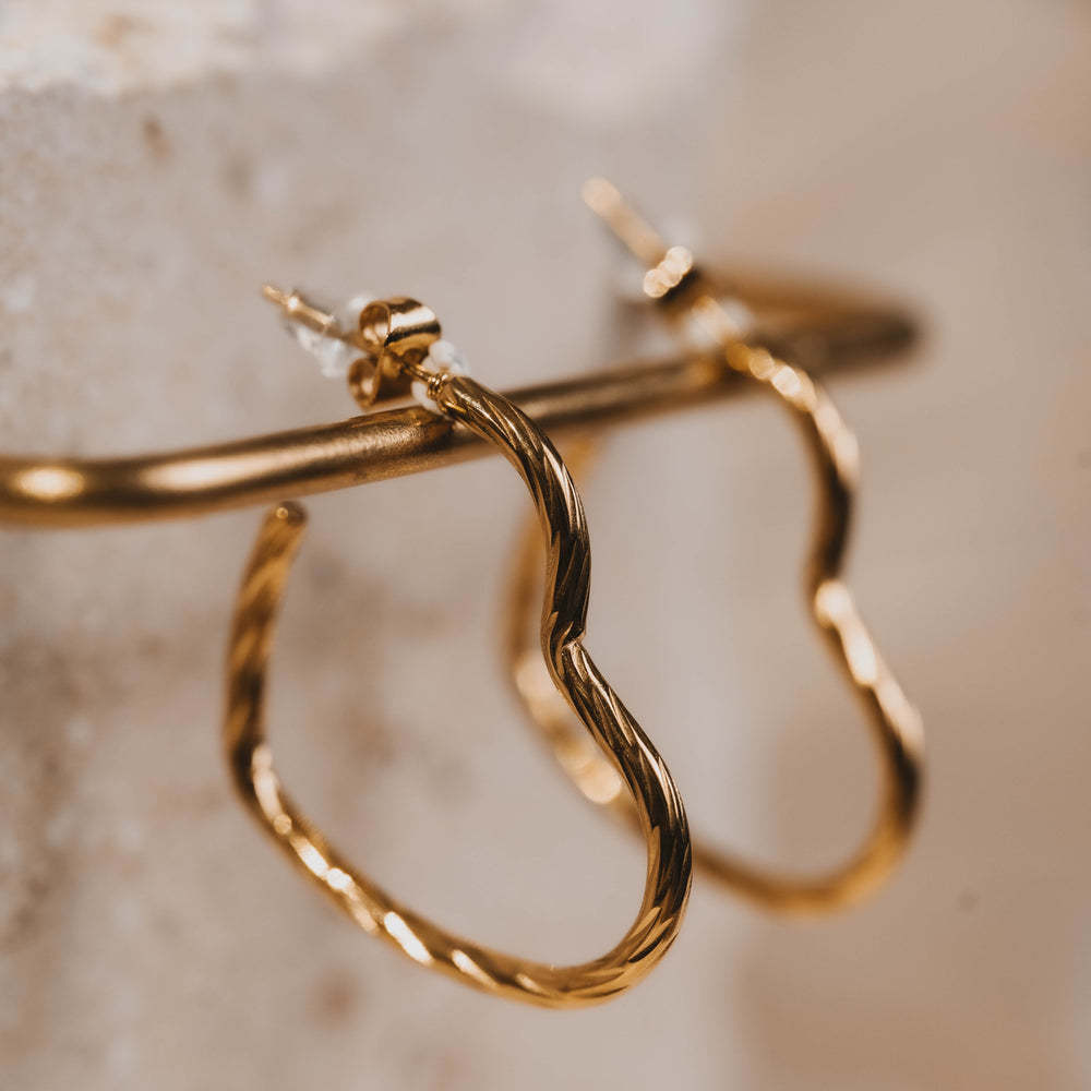 
                      
                        Fira | Boucles d'oreilles / créoles en acier inoxydable | Doré
                      
                    