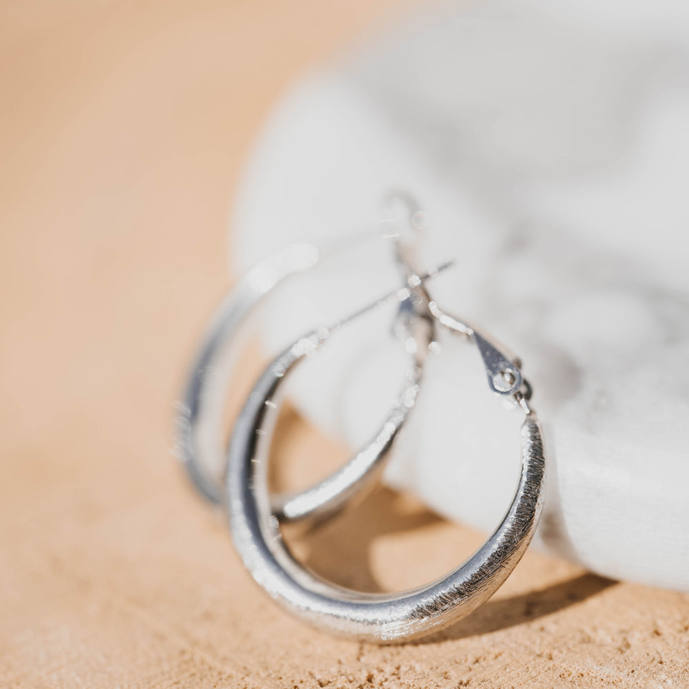 
                      
                        Rosario | Boucles d'oreilles / créoles en acier inoxydable | 2,5cm | Argenté
                      
                    
