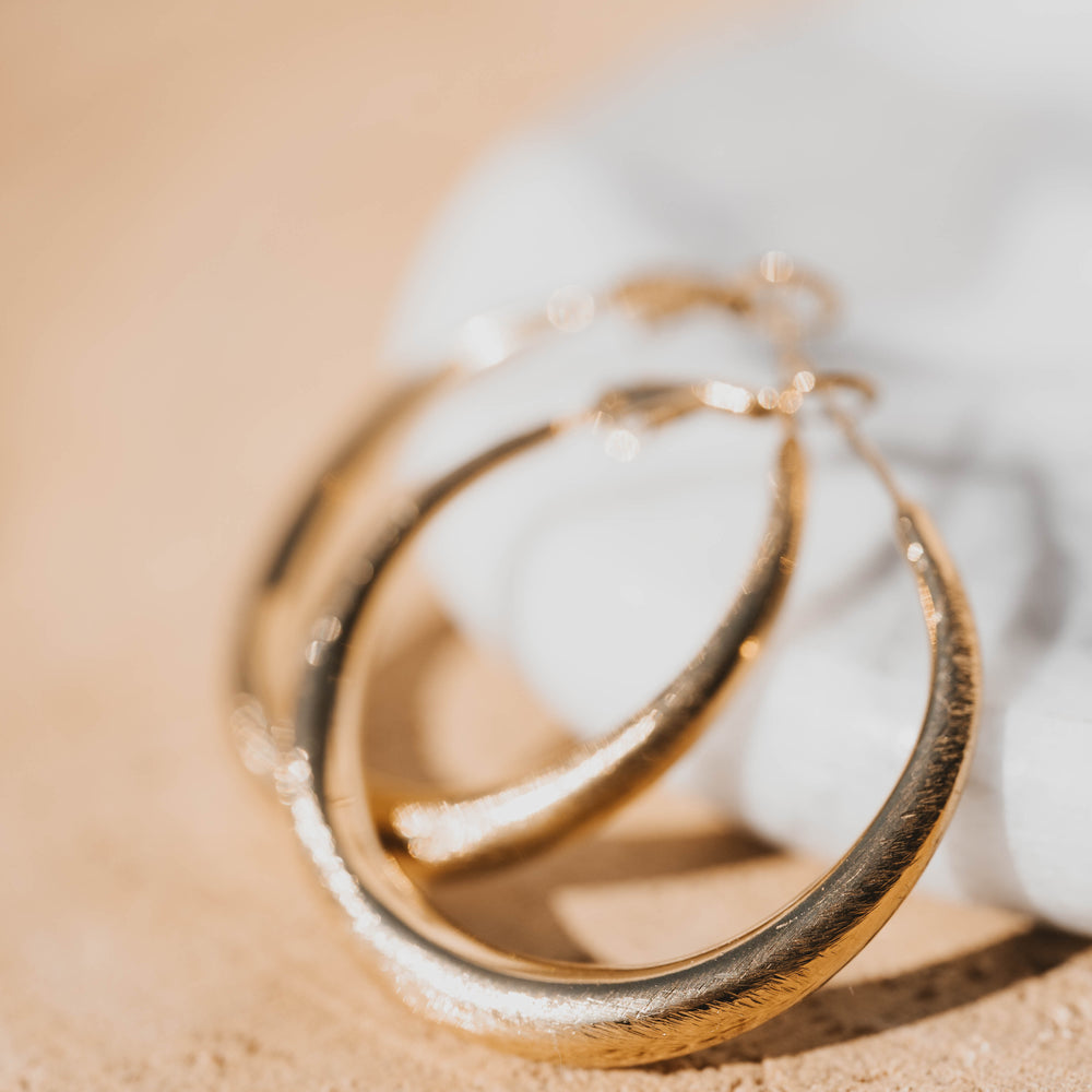 
                      
                        Rosario | Boucles d'oreilles / créoles en acier inoxydable | 3,5cm | Doré
                      
                    