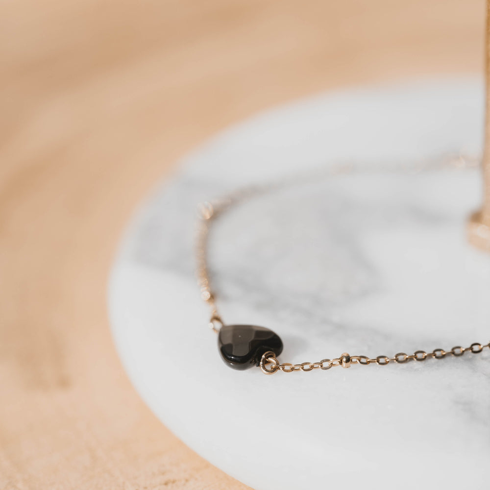 
                      
                        Bologne | Bracelet en acier inoxydable et pierre naturelle | Onyx | Doré
                      
                    