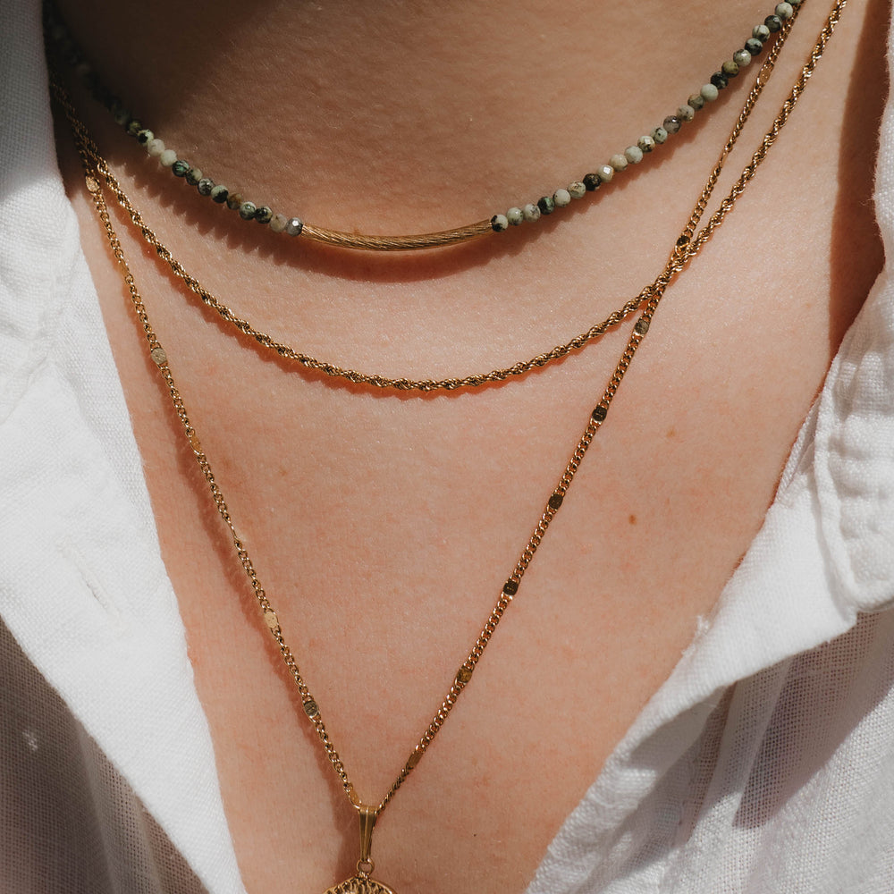 
                      
                        Atacama | Collier long en acier inoxydable | Doré
                      
                    